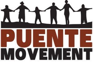 A group of people holding hands in front of the words " puente movement ".