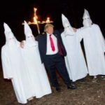 A group of people in white hoods and suits